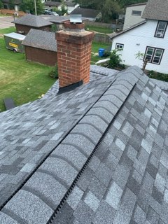 A completed roof replacement with brand-new shingles that add value to the home