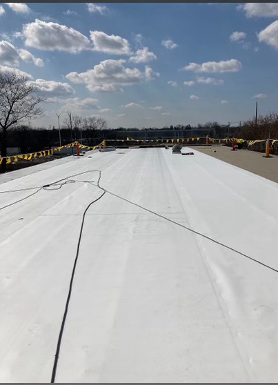 A commercial roofing project with a focus on sustainability and durability