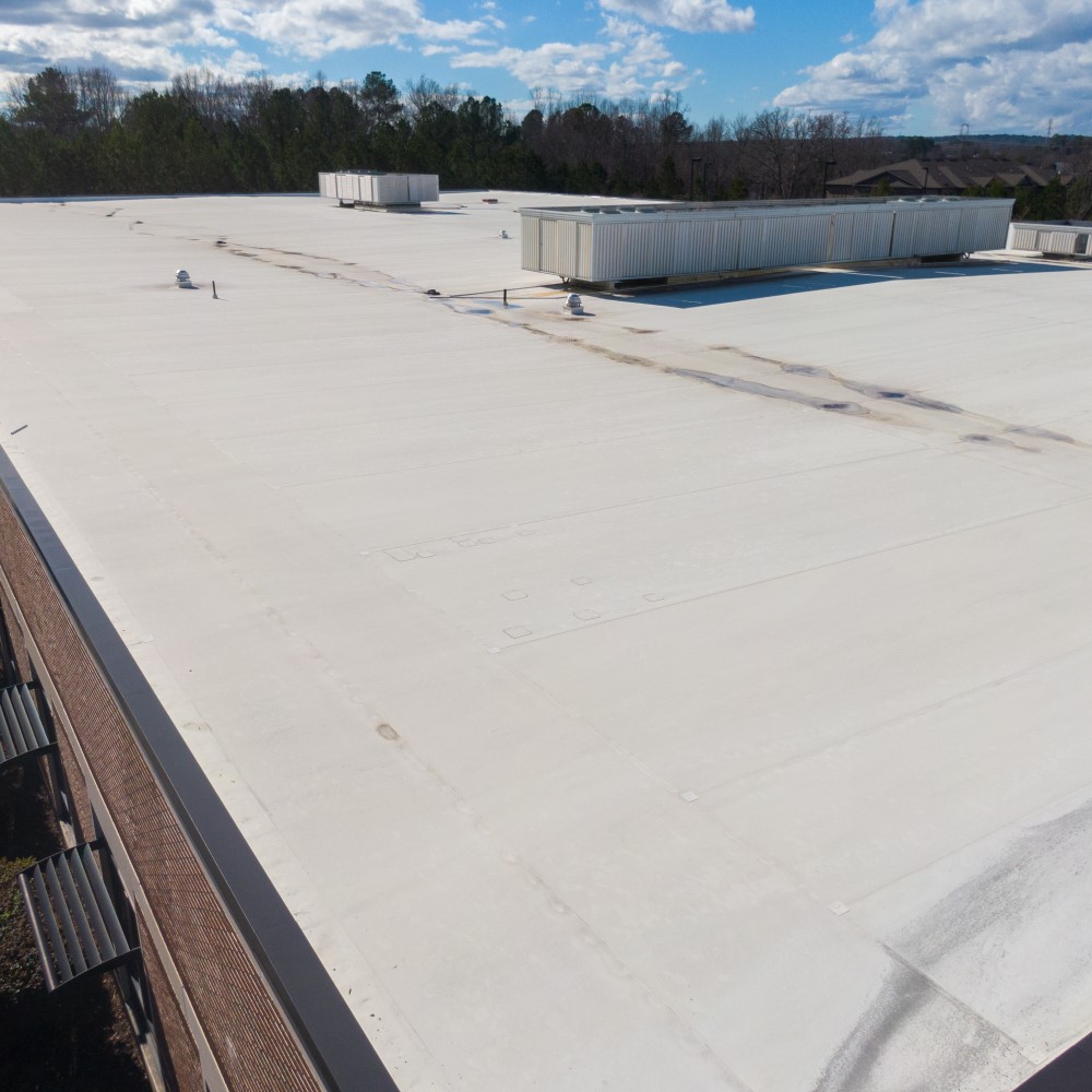 Flat roofing near me highlighting a sleek finish